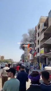 בניין עולה באש בעיראק...
