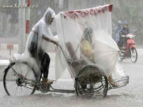 תמונת אופניים נגד גשם
