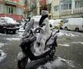 תמונות מצחיקות בולי איש השלג והקטנוע